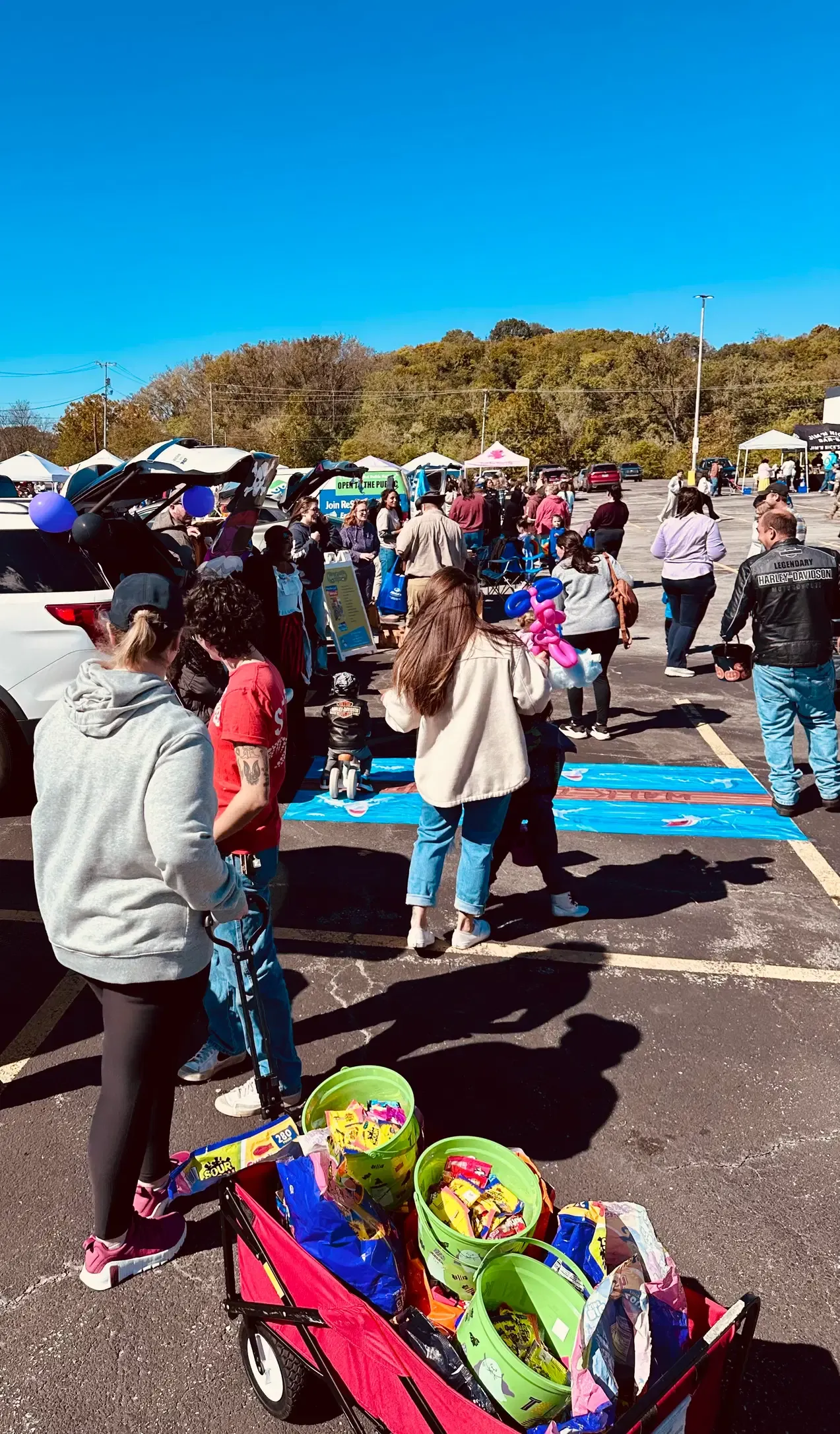 Guests gather beneath a United Way tent at the festival.