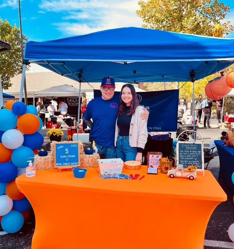 Goines to Rise volunteers serving their community at an outdoor event